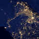 Illustration for article titled What do these nighttime satellite photos reveal about civilization?